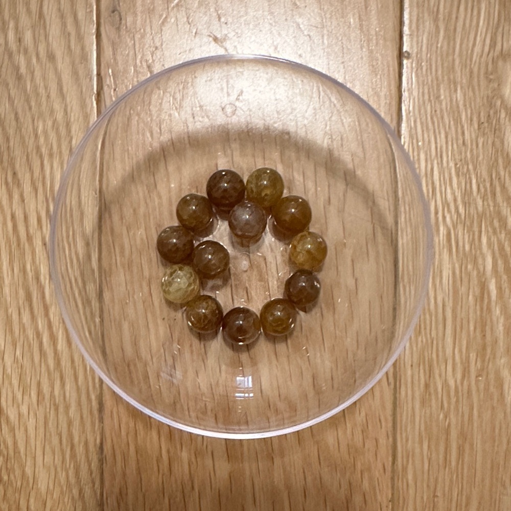 Greenish brown slightly transparent glass beads - qty 13